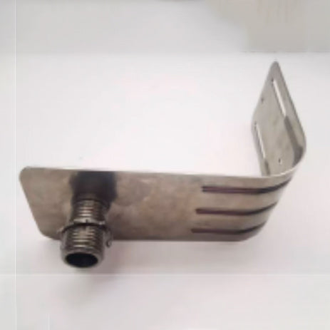A L-bracket laying sideways on a table displaying the screwing mechanism on the bottom against a white background